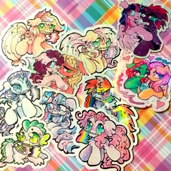 Size: 1200x1200 | Tagged: safe, artist:larvaecandy, imported from derpibooru, applejack, big macintosh, fluttershy, pinkie pie, rainbow dash, rarity, spike, sugar belle, tempest shadow, tree hugger, twilight sparkle, alicorn, dragon, earth pony, pegasus, pony, unicorn, :3, abstract background, alternate eye color, alternate hairstyle, asexual pride flag, back fluff, bangs, beanbrows, big eyes, big hooves, bilight sparkle, bisexual pride flag, blonde mane, blonde tail, blue coat, blue eyes, blushing, bong, bonnet, broken horn, bubble, bust, chest fluff, clothes, colored, colored eyebrows, colored sclera, colored underhoof, colored wings, colored wingtips, curly mane, curly tail, curved horn, doodle, dreadlocks, drug use, drugs, ear fluff, eye clipping through hair, eyebrows, eyebrows visible through hair, eyelashes, eyeshadow, facing each other, fangs, female, fetlock tuft, fire, flat colors, floating heart, floppy ears, floral head wreath, flower, flutterhigh, flutterhugger, folded wings, freckles, gay pride flag, glasses, green coat, green eyes, green sclera, group, hair tie, heart, heart eyes, high, high res, holding, holding flag, hoof hold, horn, hug, irl, lesbian, lesbian pride flag, lidded eyes, long mane, looking at each other, looking at someone, looking back, magenta sclera, makeup, male, mane seven, mane six, mare, marijuana, mixed media, mouth hold, multicolored background, multicolored hair, multicolored mane, multicolored tail, multicolored wings, narrowed eyes, no catchlights, no pupils, nonbinary, nonbinary pride flag, nonbinary spike, open mouth, open smile, orange coat, orange mane, pansexual pride flag, partially open wings, photo, pink coat, pink eyes, pink eyeshadow, pink mane, pink tail, ponytail, pride, pride flag, pride month, pride ponies, purple coat, purple eyes, purple eyeshadow, purple mane, purple sclera, purple tail, quadrupedal spike, rainbow background, rainbow hair, rainbow tail, raised hoof, raised hooves, red coat, red mane, ringlets, scarf, shiny mane, shiny tail, shipping, short horn, small wings, smiling, smiling at each other, smoking, sparkly mane, sparkly tail, spiky mane, spiky tail, spread wings, standing, sticker, sticker design, sticker set, straight, straight mane, straight tail, sugarmac, t4t, tail, teal eyes, teal sclera, tempestlight, thick eyelashes, three toned mane, three toned wings, tied mane, tied tail, tongue out, traditional art, trans big macintosh, trans female, trans fluttershy, trans sugar belle, transgender, transgender pride flag, tri-color mane, tri-colored mane, tricolor mane, tricolored mane, twilight sparkle (alicorn), two toned eyes, two toned wings, unicorn horn, unshorn fetlocks, wall of tags, white coat, wingding eyes, winged spike, wings, wolf cut, yellow coat
