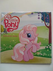 Size: 455x606 | Tagged: safe, imported from derpibooru, pinkie pie (g3), earth pony, pony, 2011, calendar, female, g3, g3.5, mare, merchandise, my little pony logo, photo, rainbow, rearing, solo, standing on two hooves, tree