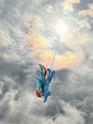 Size: 1392x1856 | Tagged: safe, artist:czscribbles, imported from derpibooru, rainbow dash, pegasus, pony, 2024 solar eclipse, aviator goggles, crepuscular rays, eclipse, female, flying, goggles, grin, irl, mare, photo, ponies in real life, rainbow trail, sky, smiling, solar eclipse, solo, spread wings, sun, wings