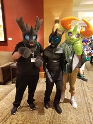 Size: 1536x2048 | Tagged: safe, artist:chainchomp2, artist:limeythecheetah, imported from derpibooru, thorax, changedling, changeling, clothes, convention, cosplay, costume, everfree northwest, fursuit, irl, photo, trio