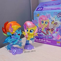 Size: 2915x2915 | Tagged: safe, imported from derpibooru, discord, fluttershy, rainbow dash, butterfly, draconequus, pegasus, pony, my little pony: pony life, chibi, china, chinese, kayou, merchandise, music notes