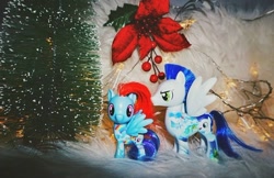 Size: 720x467 | Tagged: safe, imported from ponybooru, rainbow dash, soarin', pegasus, pony, christmas, christmas tree, female, holiday, male, mare, mistletoe, shipping, soarindash, stallion, straight, toy, tree