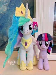 Size: 2965x3953 | Tagged: safe, imported from derpibooru, princess celestia, twilight sparkle, alicorn, pony, double dove, duo, duo female, female, front view, horn, indoors, irl, jewelry, looking at you, looking up, merchandise, official, photo, plushie, pony plushie, smiling, standing, tiara, twilight sparkle (alicorn), wings