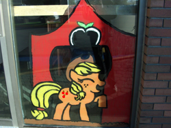 Size: 1000x750 | Tagged: safe, imported from derpibooru, applejack, earth pony, applejack's hat, barn, cowboy hat, female, hat, irl, paint, photo, raised hoof, sae, solo, window