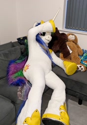 Size: 1402x2000 | Tagged: safe, artist:atalonthedeer, artist:kandathebear, imported from derpibooru, princess celestia, couch, fursuit, indoors, irl, jewelry, photo, ponysuit, regalia, sitting, solo