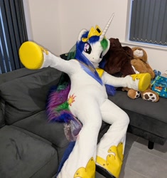 Size: 1876x2000 | Tagged: safe, artist:atalonthedeer, imported from derpibooru, princess celestia, couch, fursuit, indoors, irl, jewelry, photo, ponysuit, regalia, sitting, solo