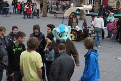 Size: 2352x1568 | Tagged: safe, artist:atalonthedeer, imported from derpibooru, lyra heartstrings, human, 2013, fursuit head, irl, irl human, multiple characters, outdoors, photo, ponysuit