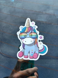 Size: 3000x4000 | Tagged: safe, imported from derpibooru, rainbow dash, human, pony, unicorn, colored hooves, glasses, hooves, horn, irl, irl human, looking at you, multicolored hair, not rainbow dash, offscreen character, offscreen human, photo, pomy, rainbow glasses, rainbow hair, solo, sticker, unshorn fetlocks