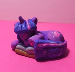 Size: 1731x1659 | Tagged: safe, artist:koidial, imported from derpibooru, part of a set, twilight sparkle, pony, unicorn, bangs, book, bookhorse, clay, colored paw pads, eyes closed, female, horn, irl, lying down, mare, open book, paw pads, paws, paws on pony, photo, polymer clay, prone, purple coat, shiny eyelashes, sleeping, straight mane, straight tail, three quarter view, three toned mane, three toned tail, traditional art, unicorn horn, unicorn twilight