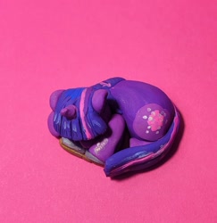 Size: 1445x1488 | Tagged: safe, artist:koidial, imported from derpibooru, part of a set, twilight sparkle, pony, unicorn, bangs, book, bookhorse, clay, female, horn, irl, lying down, mare, open book, overhead view, photo, polymer clay, prone, purple coat, sleeping, straight mane, straight tail, three toned mane, three toned tail, traditional art, unicorn horn, unicorn twilight