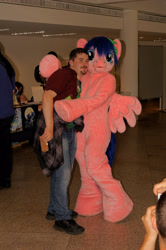 Size: 3264x4912 | Tagged: safe, artist:atalonthedeer, imported from derpibooru, firefly, human, 2014, duo focus, fursuit, g1, galacon, indoors, irl, irl human, photo, ponysuit