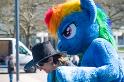 Size: 1920x1281 | Tagged: safe, artist:atalonthedeer, imported from derpibooru, rainbow dash, human, 2016, brony fair, fursuit, hat, irl, irl human, outdoors, photo, ponysuit