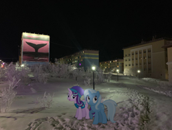 Size: 1066x800 | Tagged: safe, artist:mundschenk85, artist:parclytaxel, artist:slavaboobrony, artist:zslnews, imported from derpibooru, starlight glimmer, trixie, pony, unicorn, anadyr, chukotka, city, clothes, commieblocks, cute, diatrixes, fanfic art, female, happy, hat, horn, irl, looking up, mare, my little pony, night, open mouth, outdoors, photo, plattenbau, ponies in real life, raised hoof, russia, siberia, snow, starlight glimmer is not amused, streetlight, unamused, weather team, winter outfit, winter wrap up vest