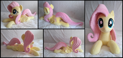 Size: 3480x1654 | Tagged: safe, artist:littlefairyswonders, imported from derpibooru, fluttershy, pony, irl, lying down, photo, plushie, prone, solo