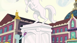 Size: 1000x563 | Tagged: safe, imported from derpibooru, screencap, sci-twi, twilight sparkle, equestria girls, canterlot high, clothes, hoodie, horse statue, my little pony equestria girls: friendship games, solo