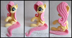 Size: 2076x1102 | Tagged: safe, artist:littlefairyswonders, imported from derpibooru, fluttershy, pegasus, pony, female, irl, mare, photo, plushie, sitting, smiling, solo